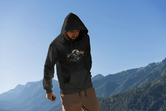 Man standing with mountains in the background