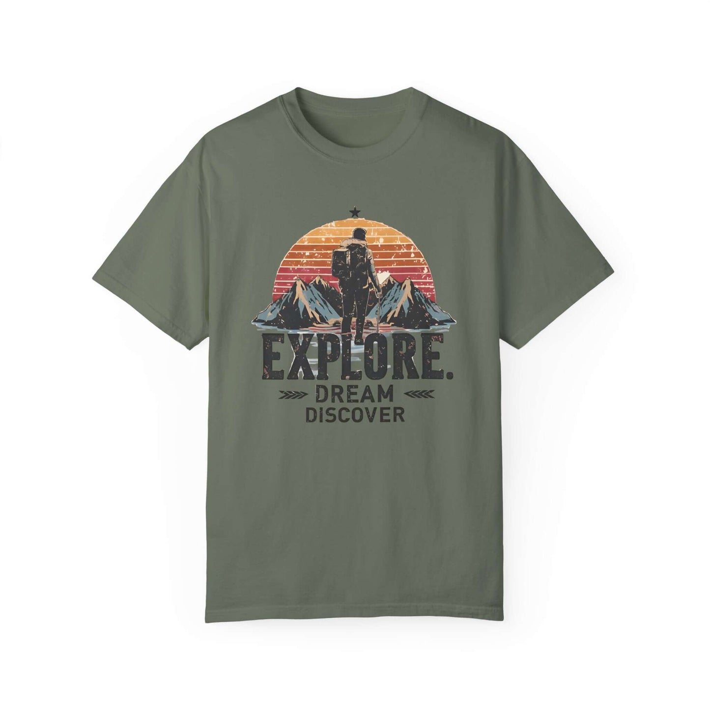 Adventure-ready women’s t-shirt featuring 'Explore. Dream. Discover' and scenic graphics in dark green.