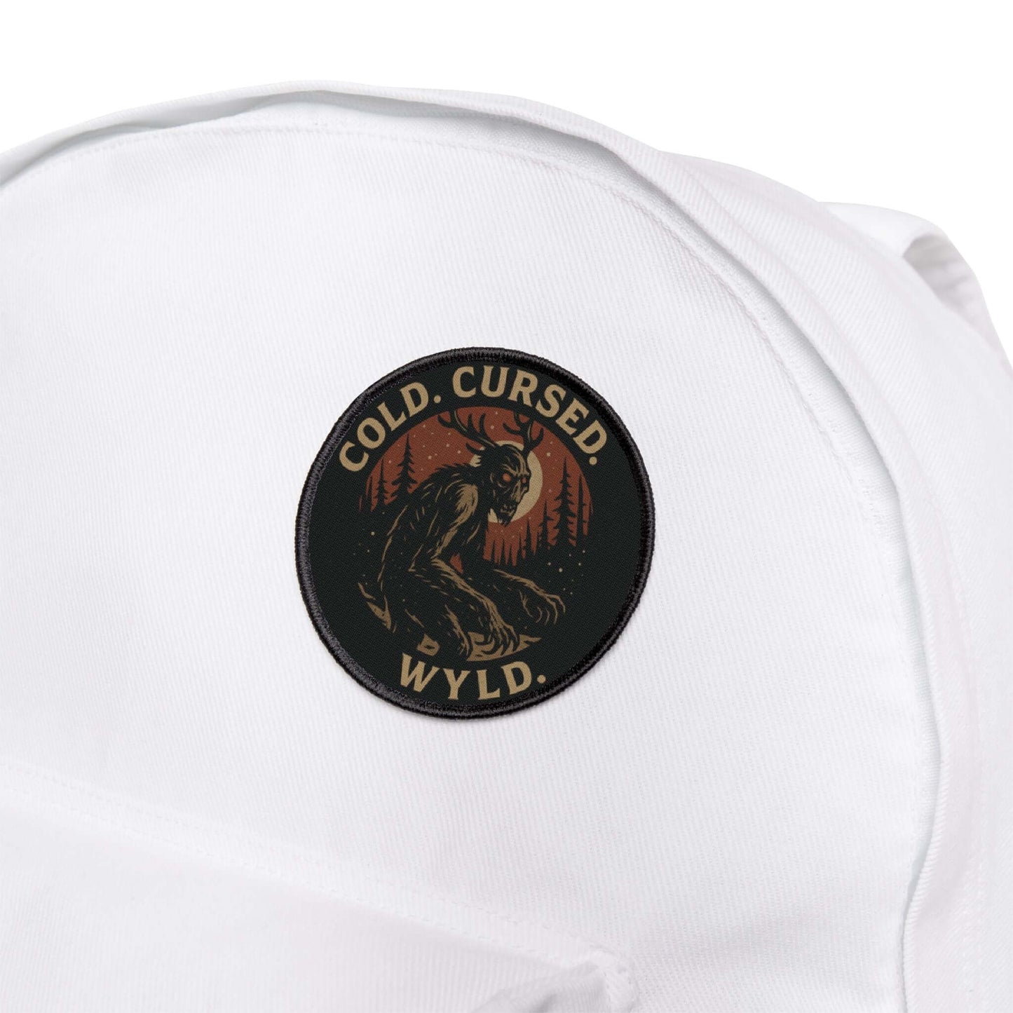 Wyld Peak Do Not Feed the Wendigo cryptid patch on a white backpack
