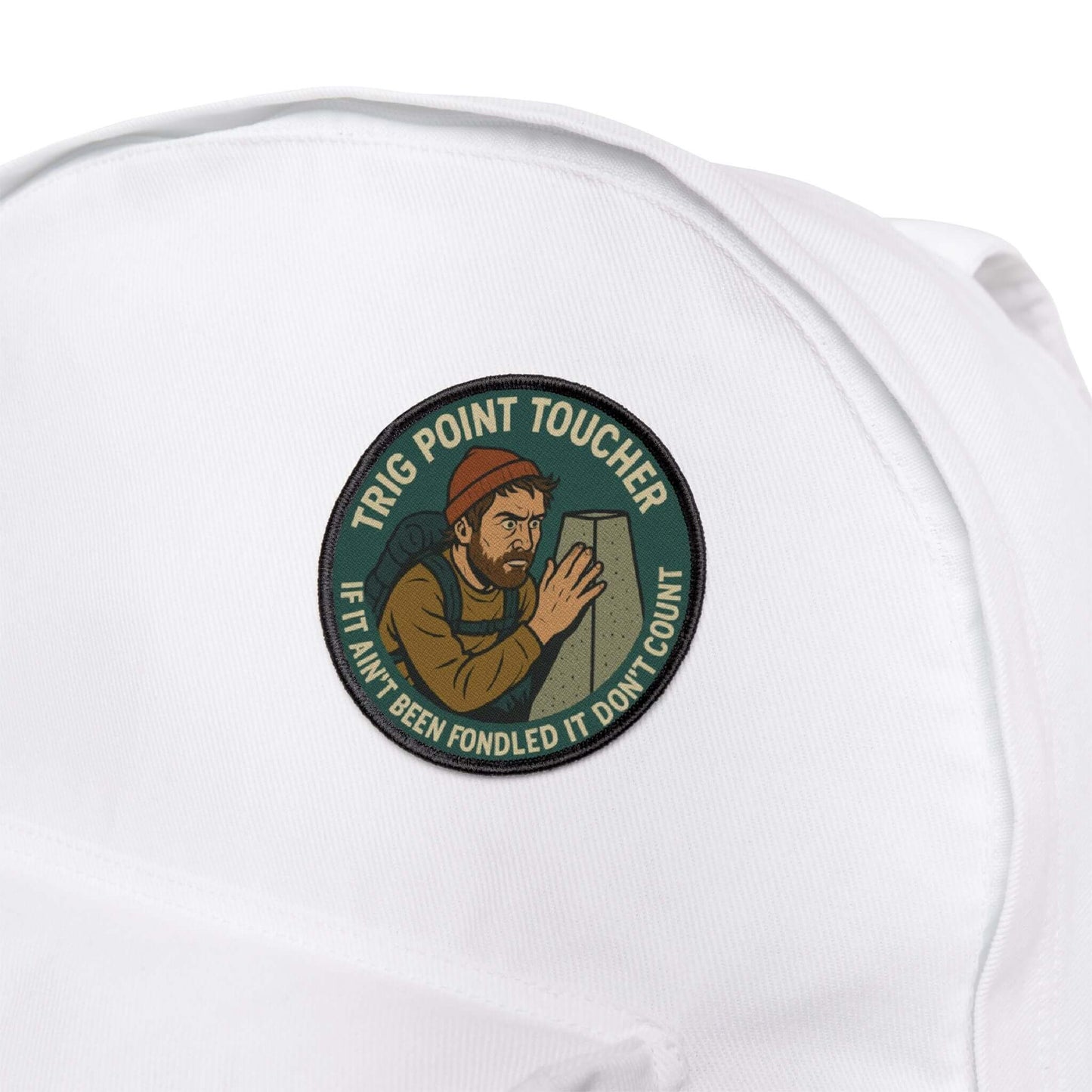 Wyld Peak Obsessive Summit Stroking Club patch on a white backpack