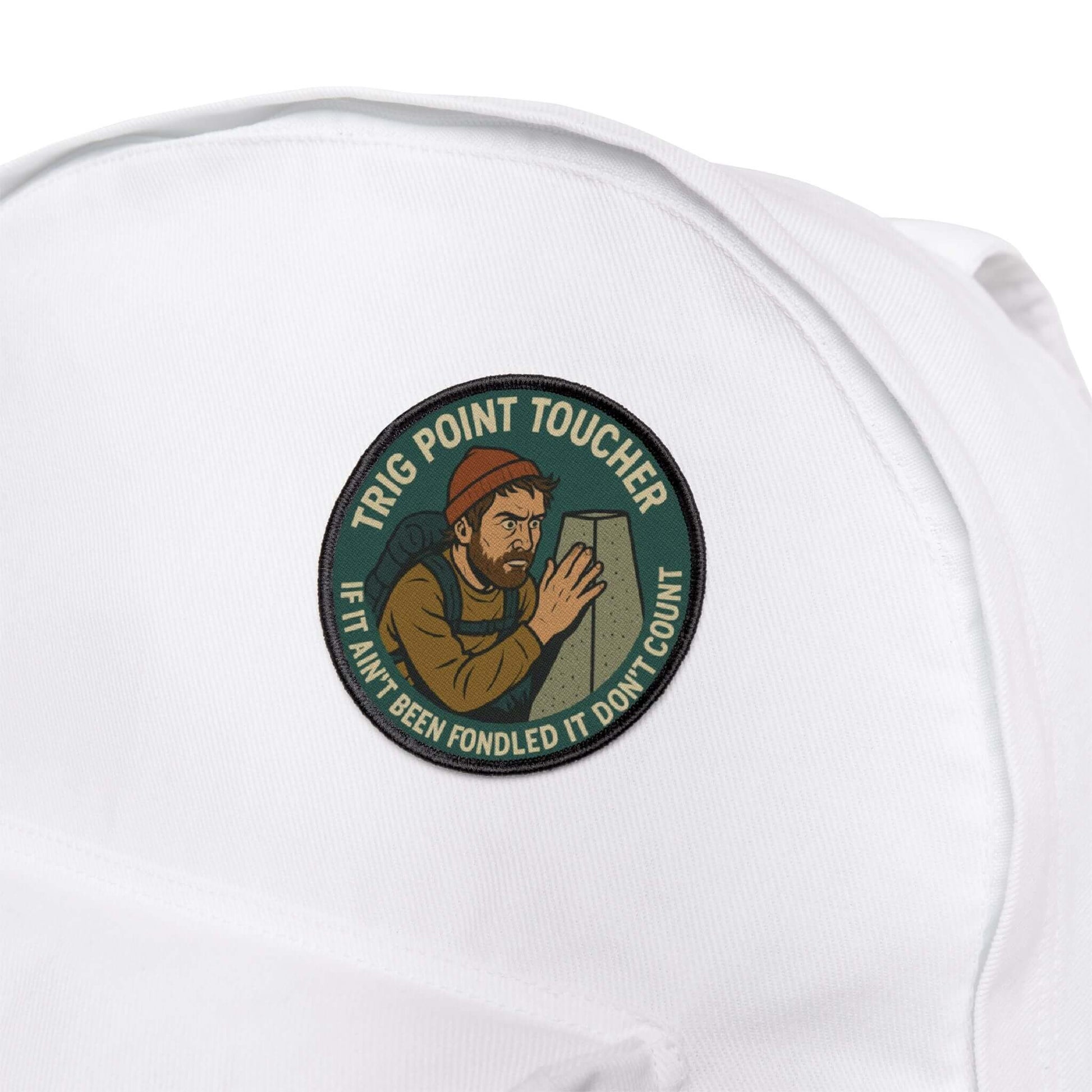 Wyld Peak Obsessive Summit Stroking Club patch on a white backpack