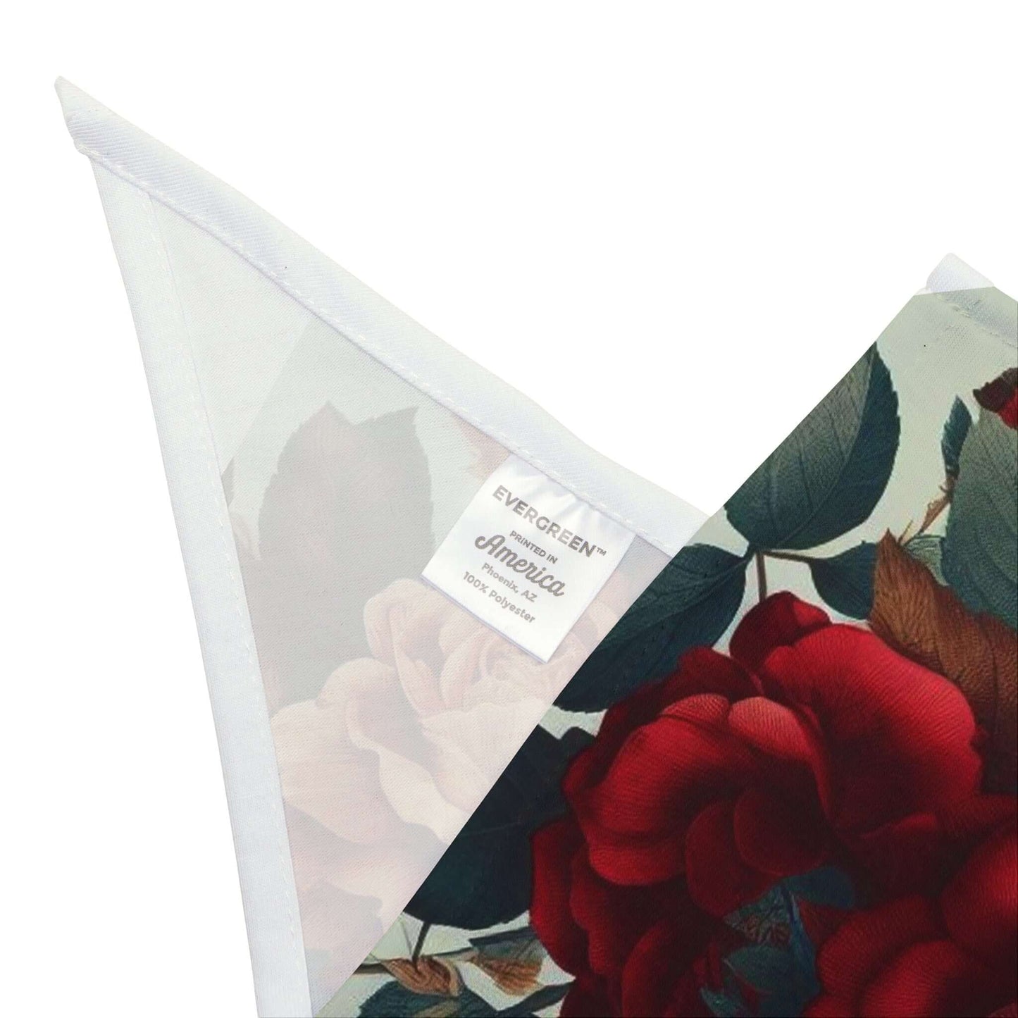 Wyld Peak pet bandana in rose floral design folded, white background.