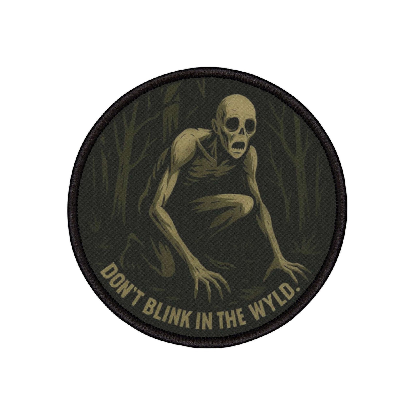 Wyld Peak Rake cryptid patch on a white background