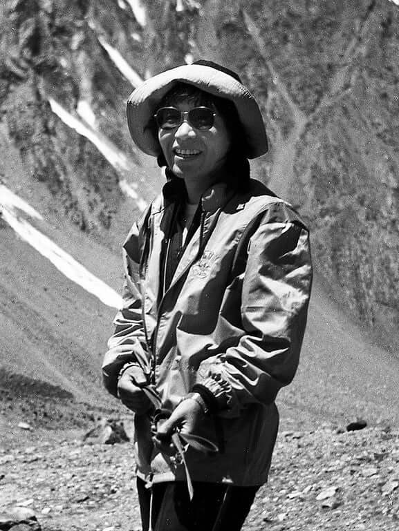 Junko Tabei standing in the Himalayas, black and white historic mountaineering photo