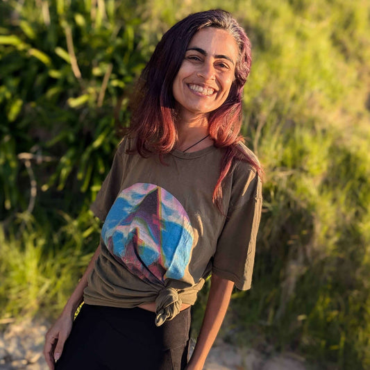 Stylish women’s ringspun cotton tee featuring a bold graphic design, perfect for casual outfits.