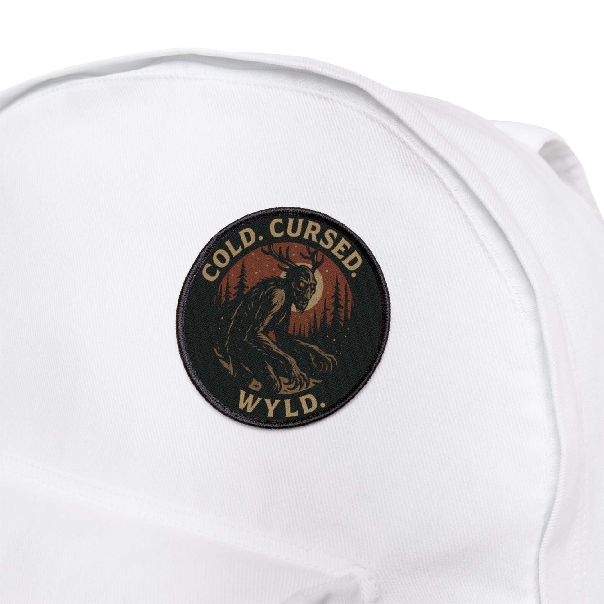 Wyld Peak Do Not Feed the Wendigo cryptid patch on a white backpack