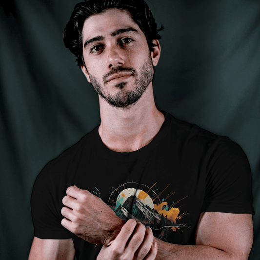 Adventure-ready men's black t-shirt tee with a stunning mountain design, crafted from premium cotton for comfort.