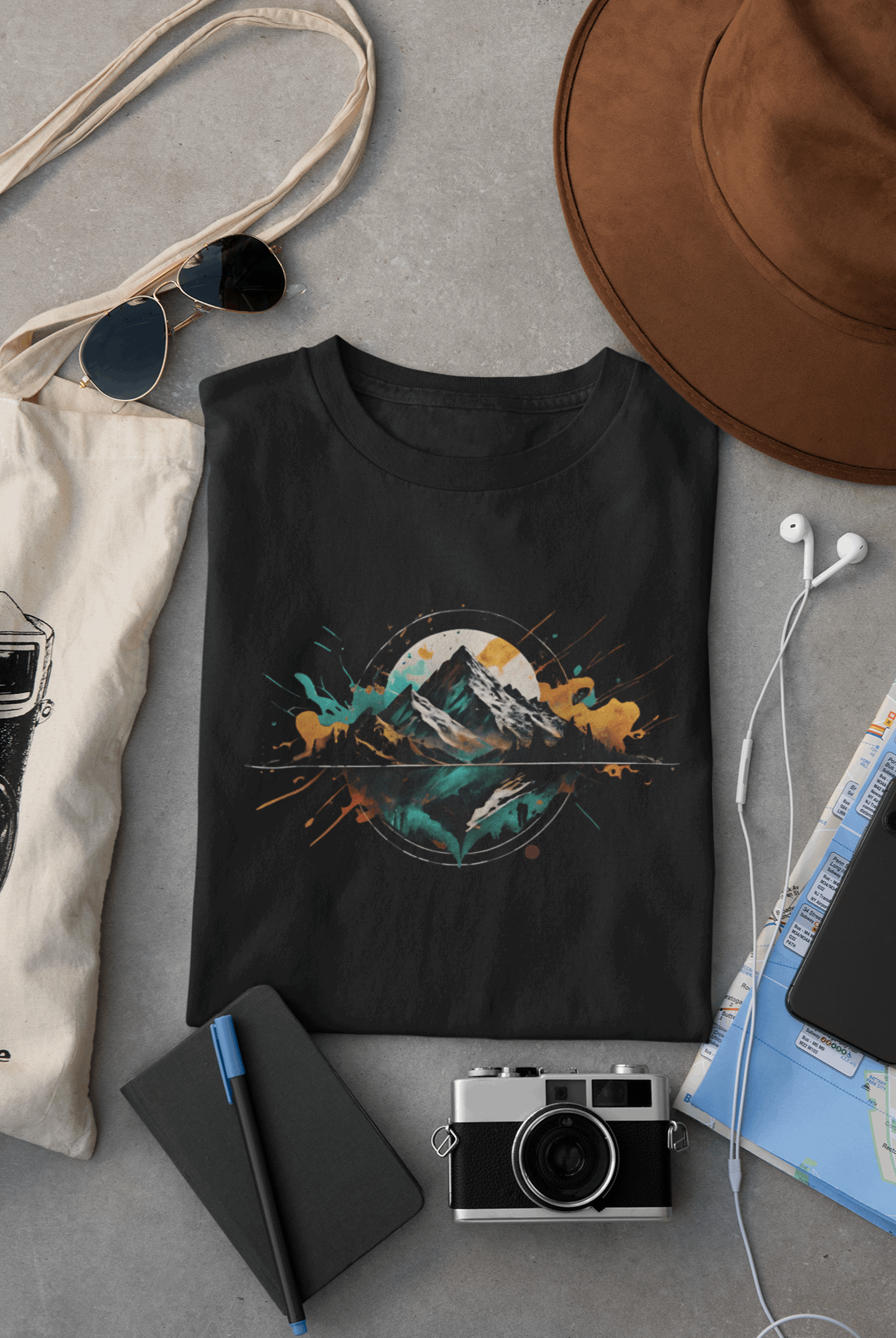 Wyld Peak Peak men’s organic cotton t-shirt in black laid flat on a desk