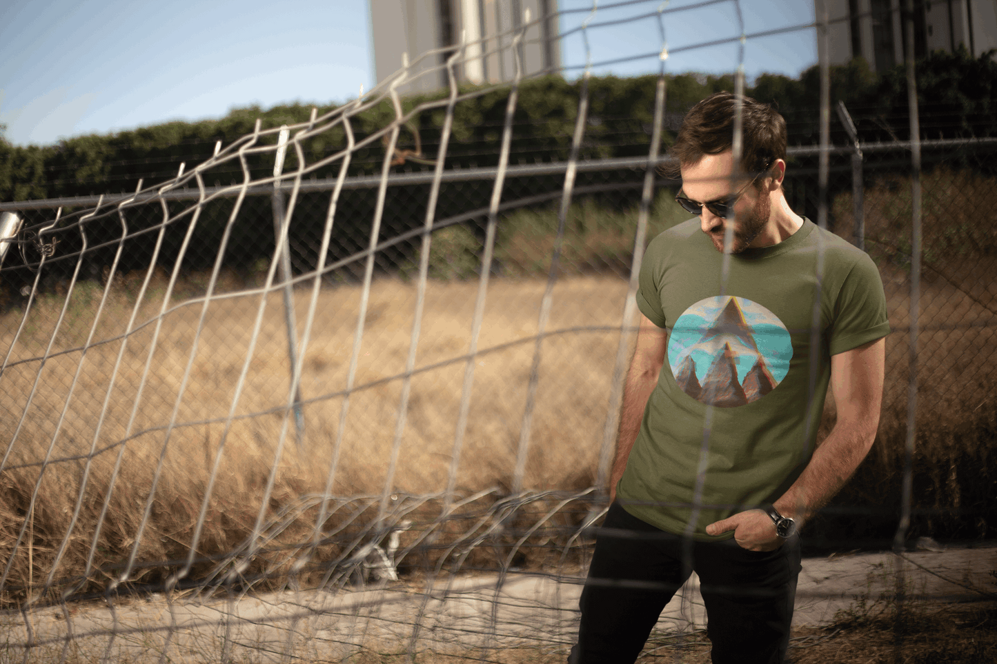 Man wearing Wyld Peak Fusion Peak tee in army green in California