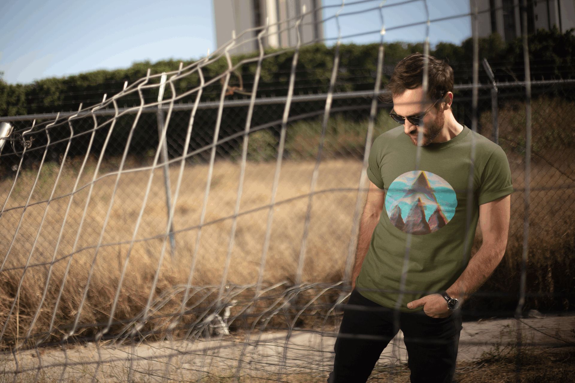 Man wearing Wyld Peak Fusion Peak tee in army green in California