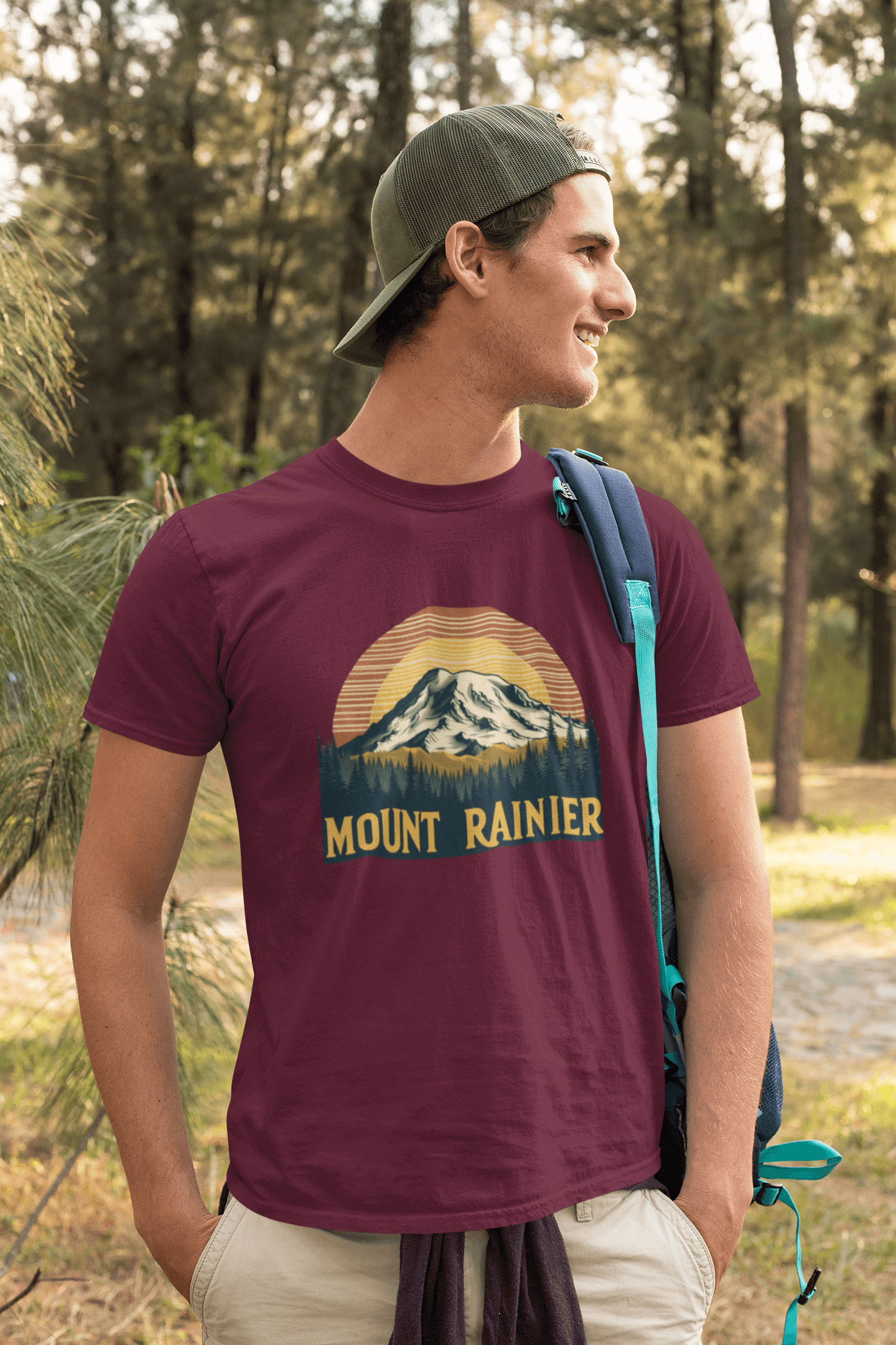 Maroon Mount Rainier National Park tee from Wyld Peak worn by a man on a hike in America.