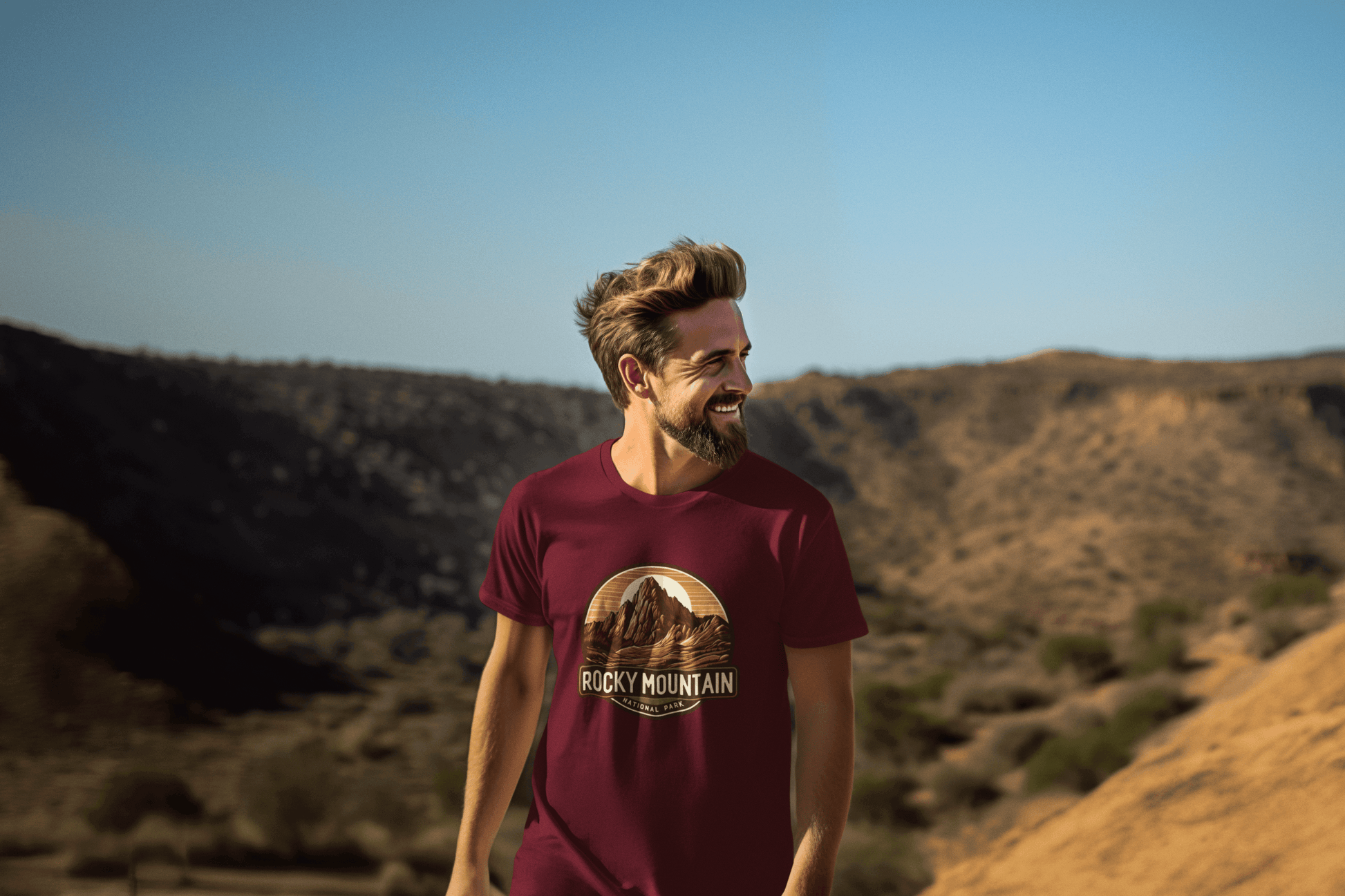 Man outdoors wearing Wyld Peak Rocky Mountains National Park organic tee in maroon.